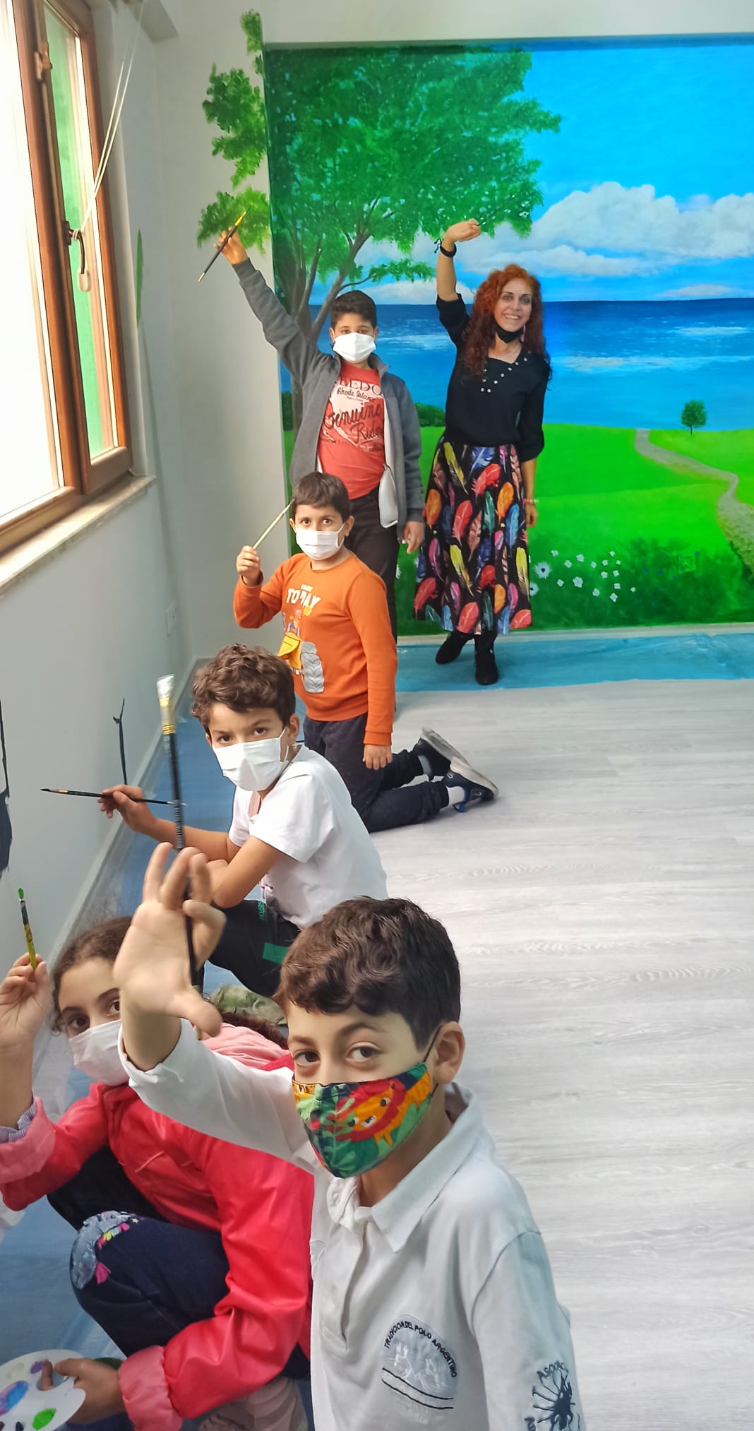 Children painting a room