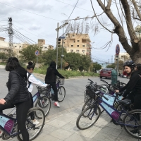 A group of young women on bikes