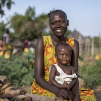Woman and child facing the camera