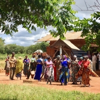 Women dancing outside.