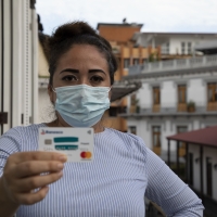 Woman holding ID card