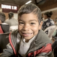 Child smiling.