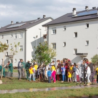 People outside of a housing unit.