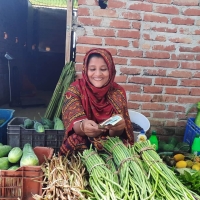 Women farmer selling vegetable at collection center -Helvetas-Jahangir Kabir