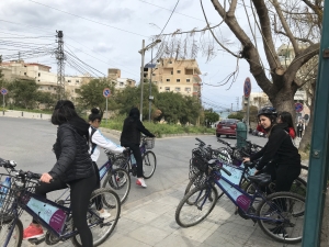 A group of young women on bikes