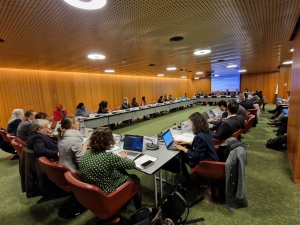 Support Platforms meeting December 2022 - participants sit in a rectangle behind desks