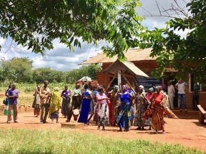 Women dancing outside.