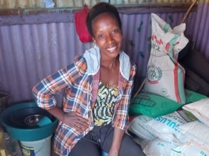 Esperence at her maize flour business