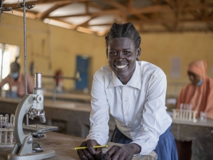 Nyater a refugee from South Sudan studying in the laboratory