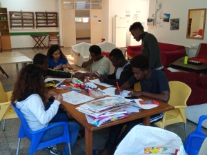 People seating around a table, drawing.