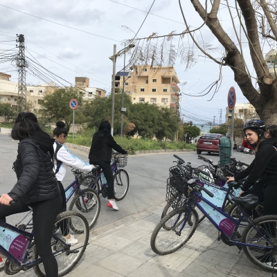 A group of young women on bikes