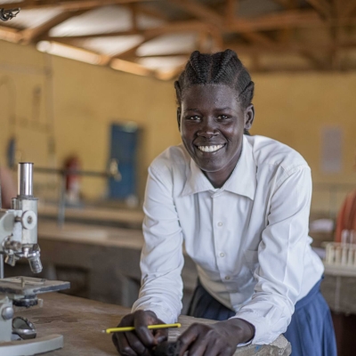 Nyater a refugee from South Sudan studying in the laboratory