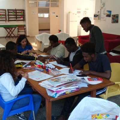 People seating around a table, drawing.