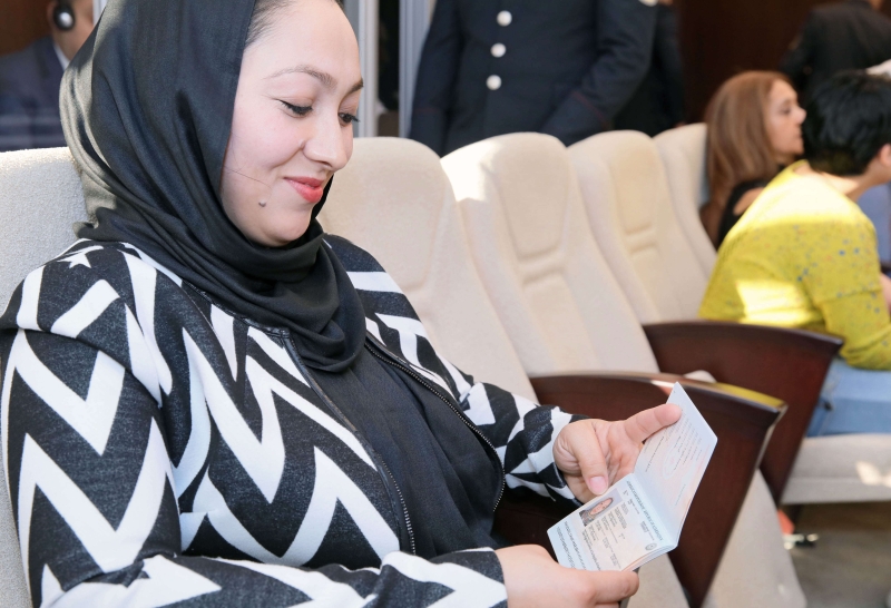 Women holding passport