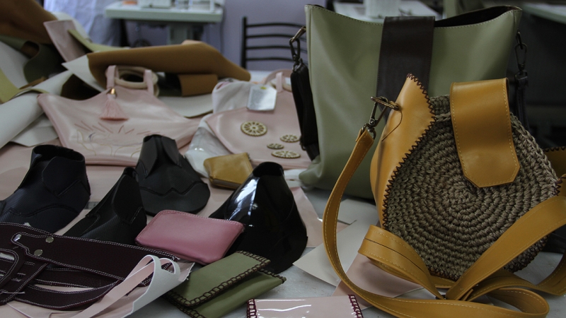 A table covers in products sold by the cooperative such as bags and wallets