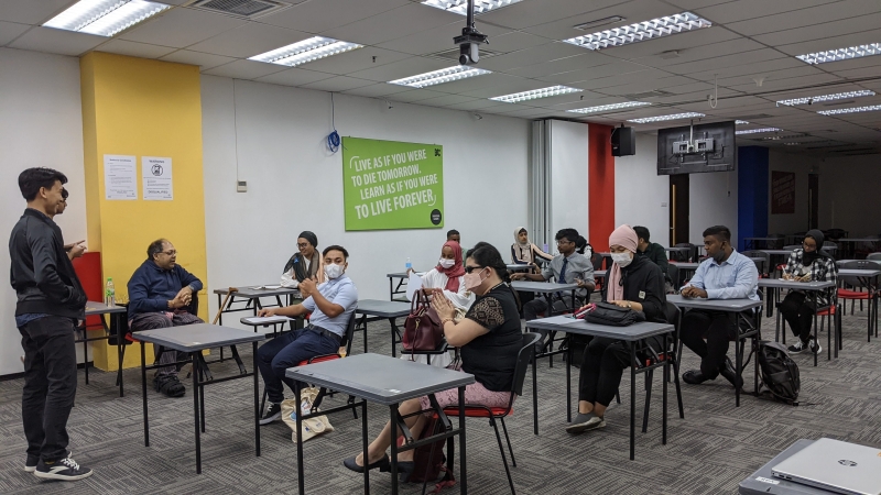 Students sit in a classroom