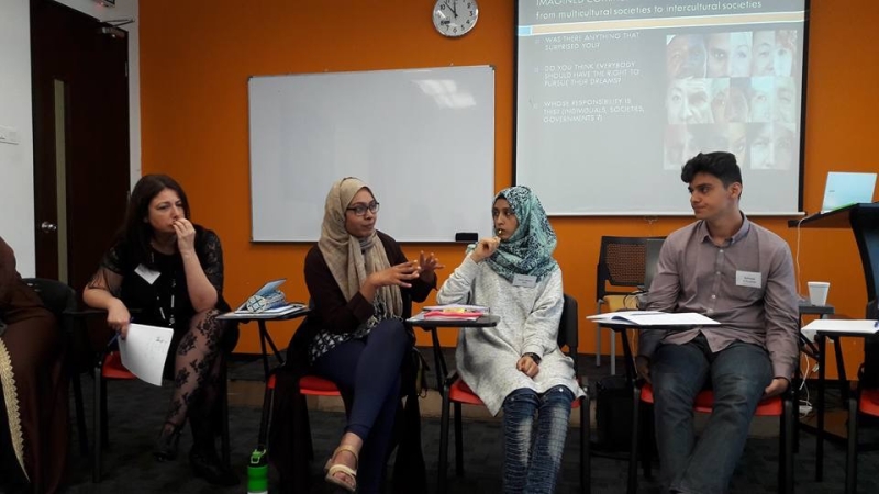 Students in a classroom debating