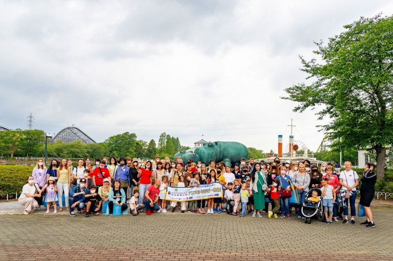 A group of people pose and smile