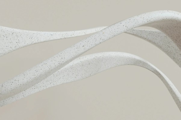 A cream background with three white waves going horizontally across