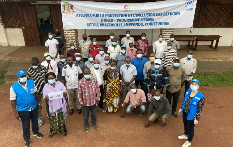 Aerial shot of group who participated in training on protection and inclusion of refugees with local authorities and Lisungi Project stakeholders