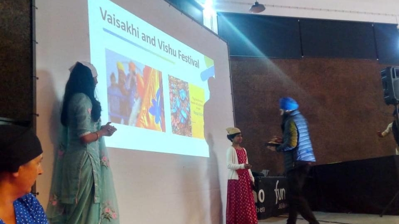 Two people are presenting on Vaisakhi and Vishnu Festival