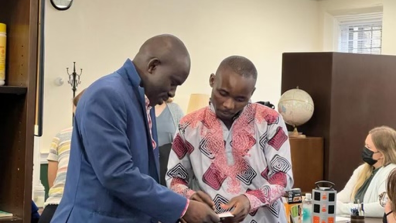 Two men talking
