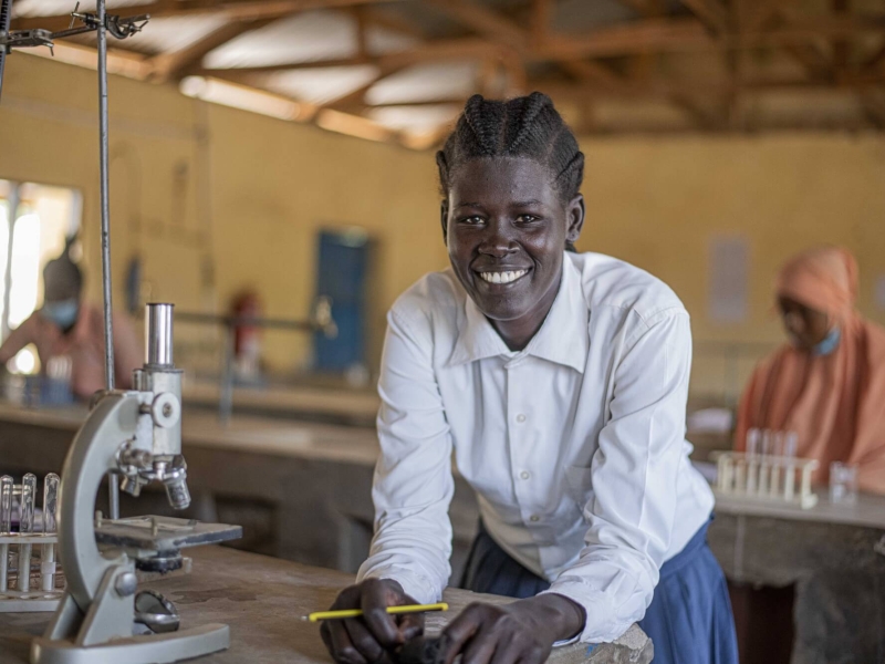 Nyater a refugee from South Sudan studying in the laboratory