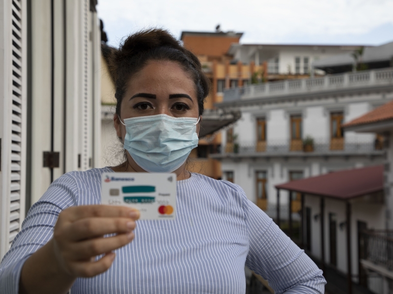 Woman holding ID card