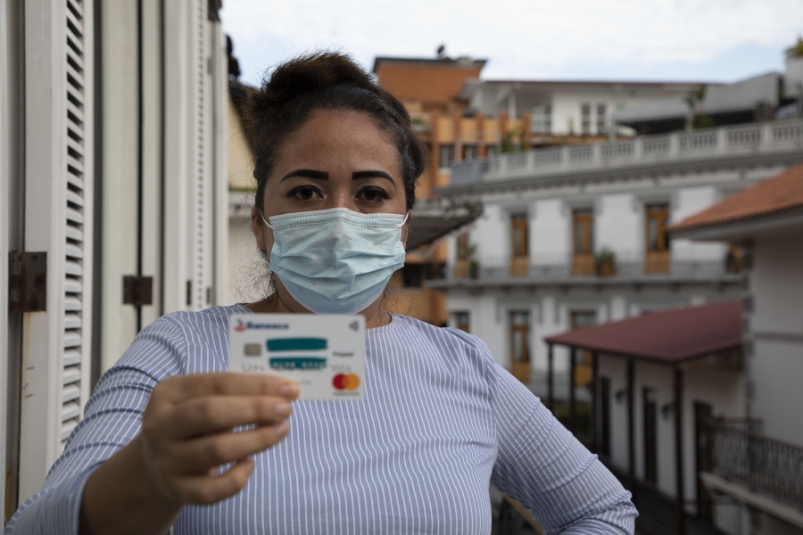 Woman holding ID card