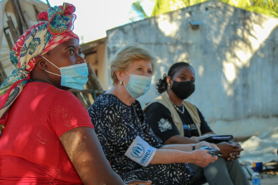 Three women wearing masks