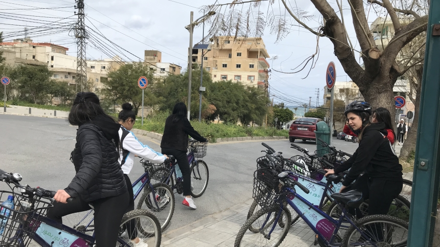 A group of young women on bikes