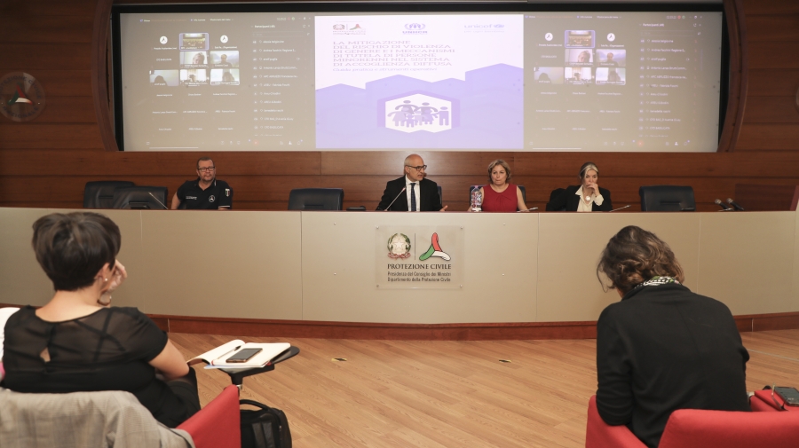 People sitting on a panel talking