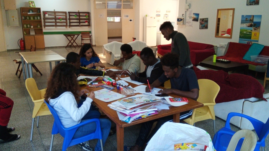 People seating around a table, drawing.