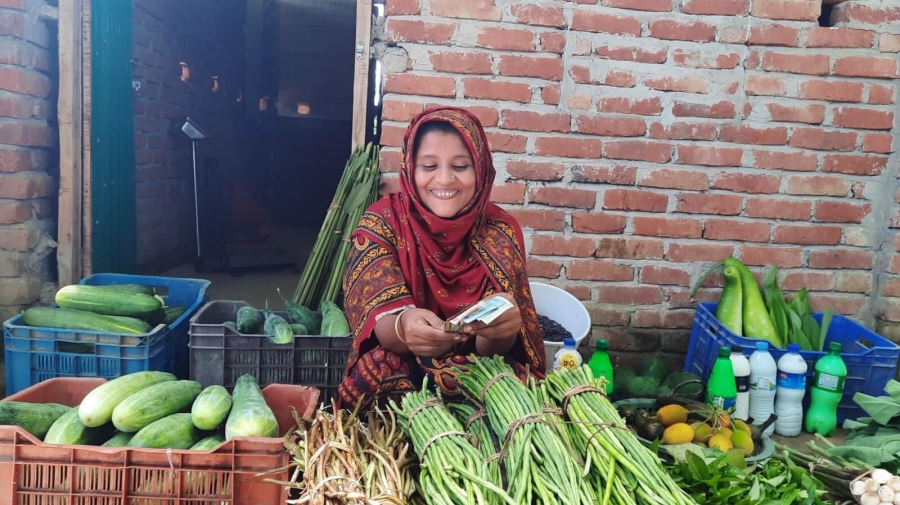 Women farmer selling vegetable at collection center -Helvetas-Jahangir Kabir